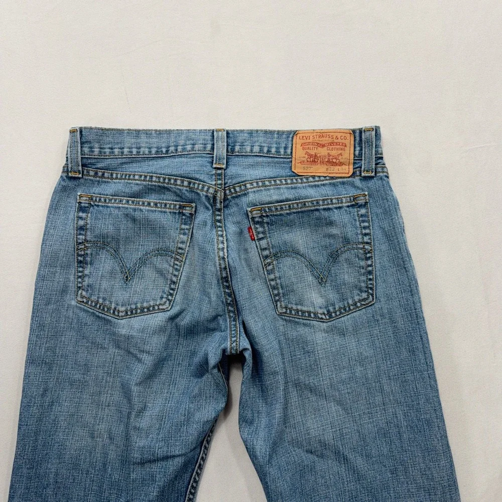 Levi's Jeans 527 Low Boot Cut Light Wash Denim Blue Mens W32 L34